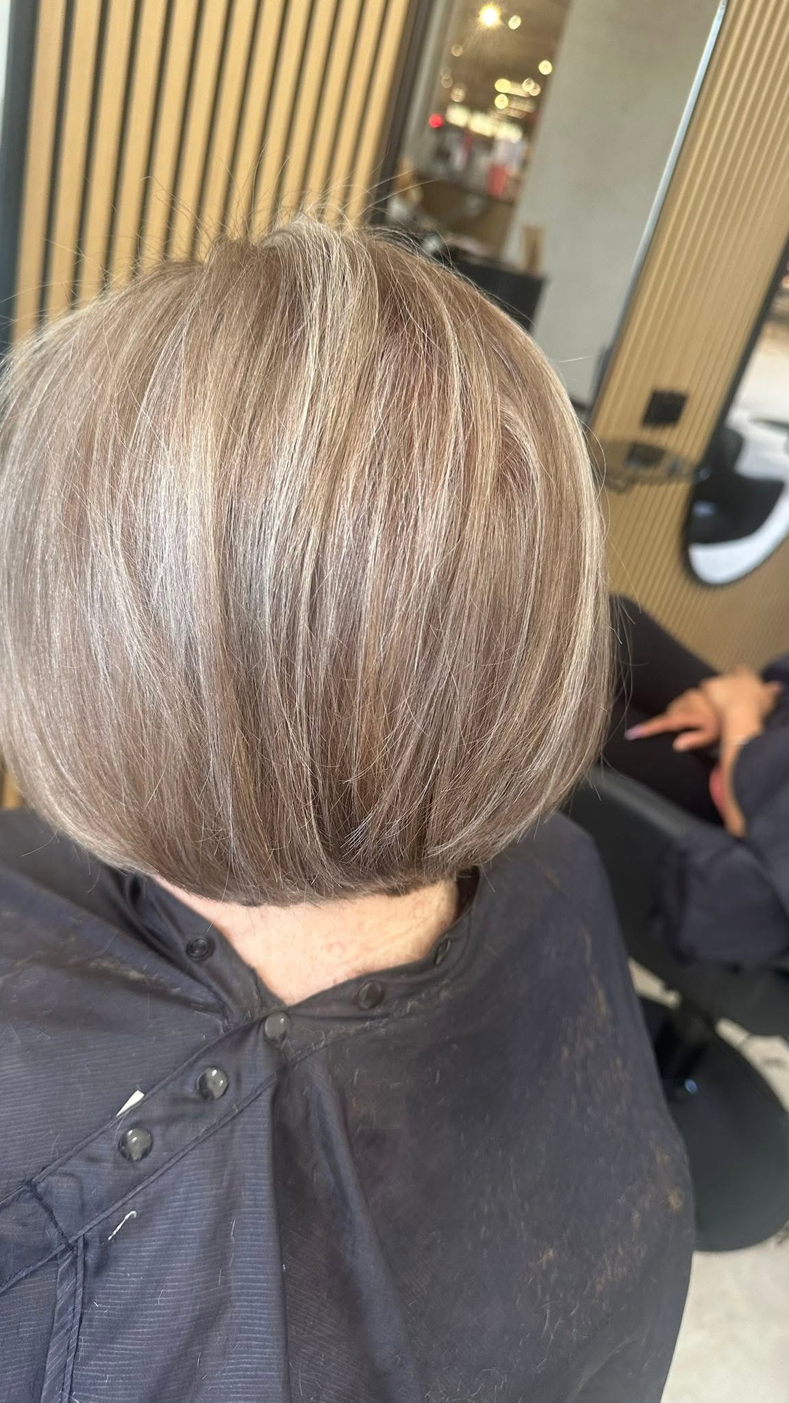 Sleek short bob with ash-blonde highlights